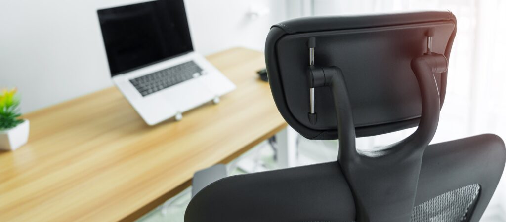 Ergonomic chair and Adjustable table with laptop computer